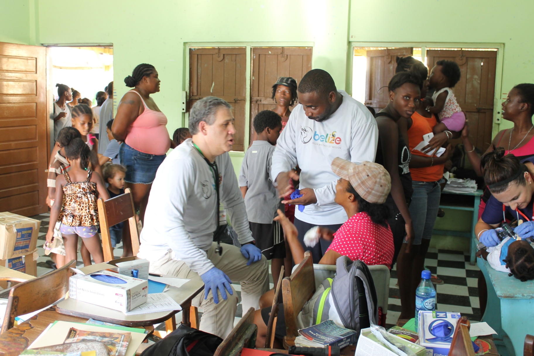 HELP team members serving families during a community outreach event